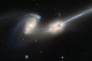 Hubble Captures Unusual Galaxy Merger in Ancient Universe
