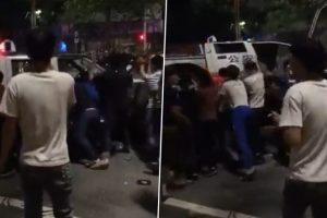 China: Stay-at-Home Order To Contain COVID-19 Spread Sparks Unrest in Guangzhou, Protesters Overturn Police Car, Tear Down Barricades (Watch Videos)