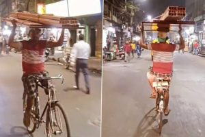 Viral Video: Man Rides Bicycle Holding Weight on His Head With Both Hands
